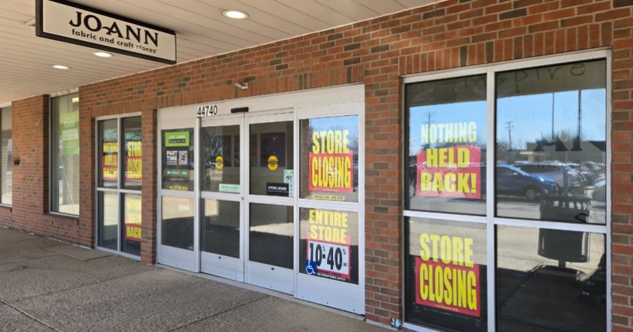 storefront with closing signs