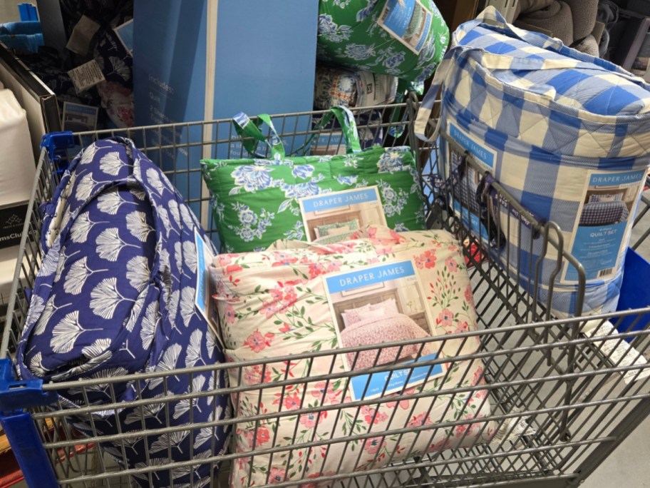 4 piece bedding quilt and sham sets in a Sam's Club shopping cart