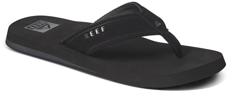 solid black flip flop that says reef on the strap